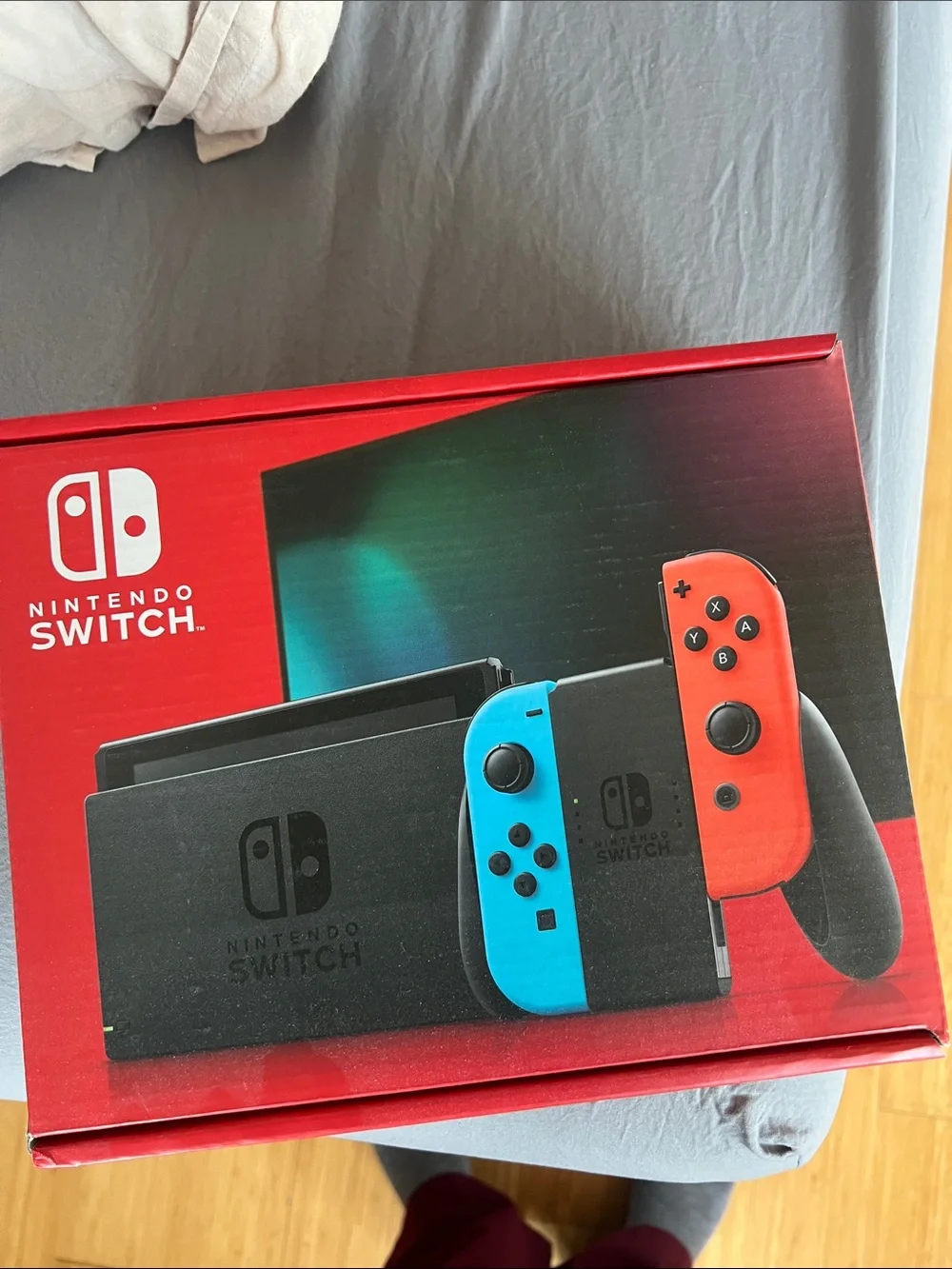 Nintendo Switch with Neon Blue and Neon Red Joy‑Con